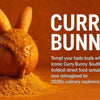 High-quality realistic photo of a vintage curry bunny loaf filled with spicy curry in a bread bowl, showcasing South Africa's iconic street food.