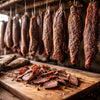 Traditional South African biltong preparation with air-dried spiced meat strips