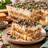 Homemade South African-style Peppermint Crisp tart with caramel, cream, biscuits and mint chocolate