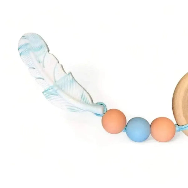 Natural wooden and silicone baby teething ring, 40mm diameter, safe and BPA-free.