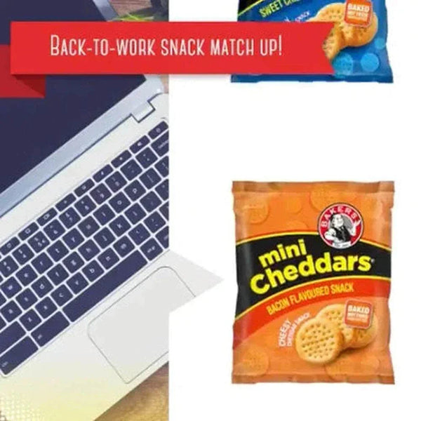 Mini Cheddars bacon flavored snack pack near laptop.