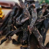 Close-up of original South African biltong sticks ready to eat, 300g pack, air-cured and seasoned dried meat snack