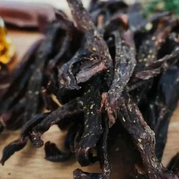 Close-up of original South African biltong sticks ready to eat, 300g pack, air-cured and seasoned dried meat snack