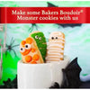 Bakers Boudoir Original Finger Biscuits decorated as colorful monster cookies in a white cup.