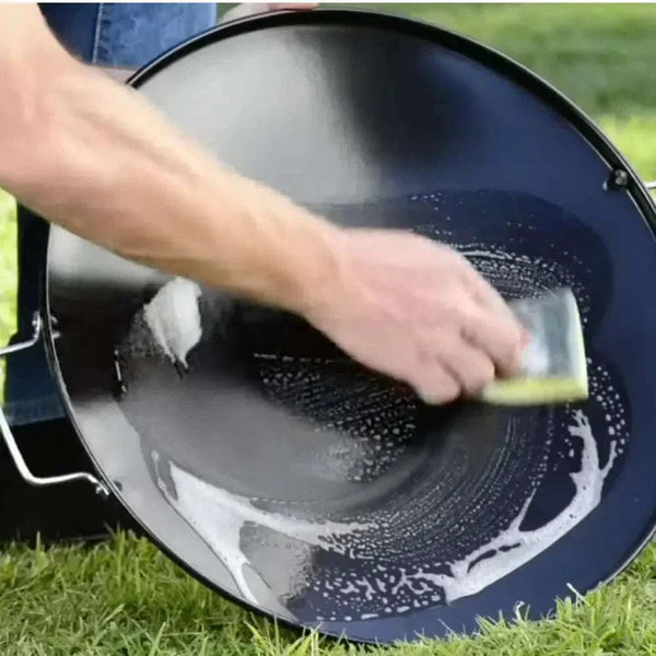 CADAC Skottel Braai being seasoned before use, highlighting essential maintenance for optimal gas BBQ cooking.