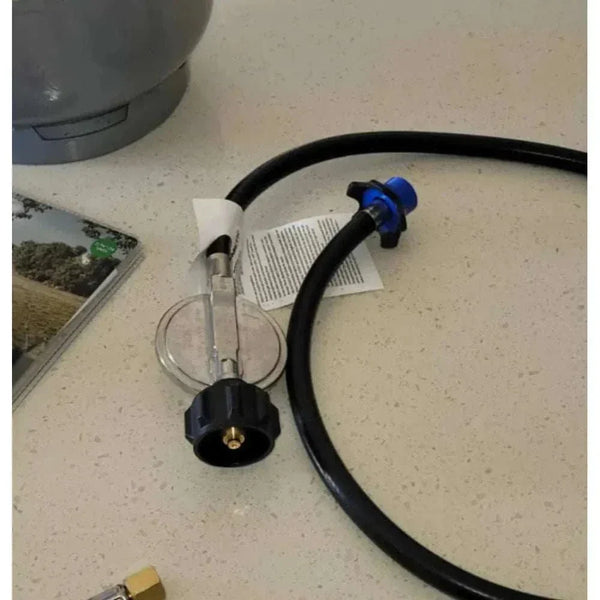 CADAC Skottel Braai gas connector and hose set for outdoor BBQ use.