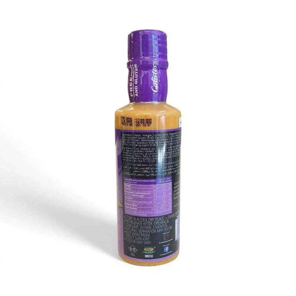 Calisto's Peri Peri Sauce - Garlic 250ml bottle with vibrant packaging highlighting gluten-free and natural ingredients.