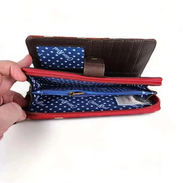 Red Cotton Road Large PVC Wallet with polka dots and zippered compartments
