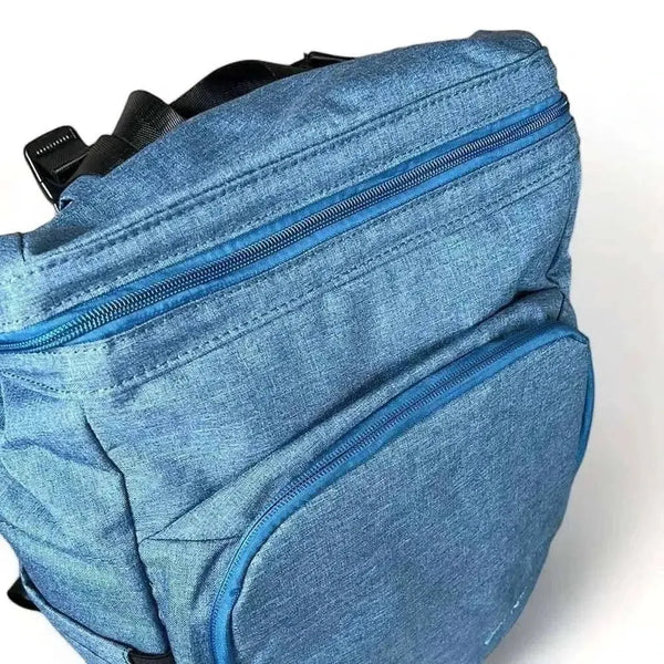 Blue Cotton Road Nappy Bag backpack with front zip, side bottle pockets, changing mat, and wet bag