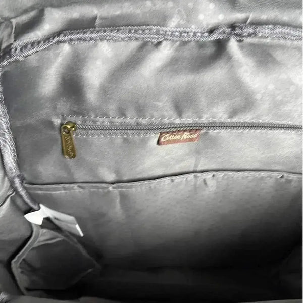 Blue Cotton Road Nappy Bag backpack with front zip compartment and side bottle pockets