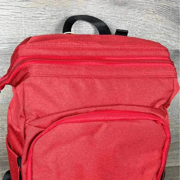 Deep red Cotton Road nappy bag backpack with multiple compartments and side bottle pockets
