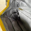 Cotton Road Nappy Bag backpack in mustard with front zip, side bottle pockets, changing mat, and wet bag