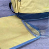 Cotton Road Nappy Bag backpack in mustard with front zip, side bottle pockets, and changing mat