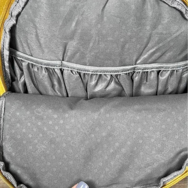 Mustard Cotton Road nappy bag backpack with multiple compartments and side pockets for bottles