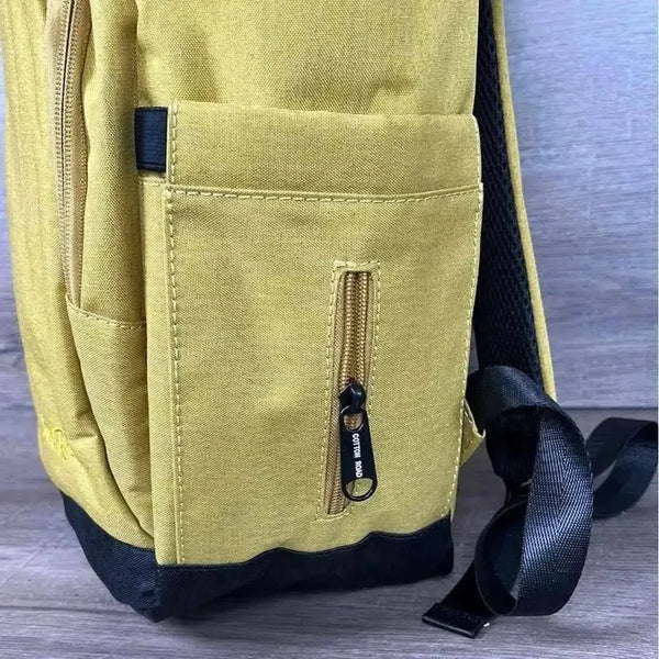 Cotton Road Nappy Bag mustard backpack with front zip and side bottle pockets