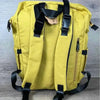 Cotton Road Nappy Bag mustard backpack with front zip, side bottle pockets, changing mat, and wet bag