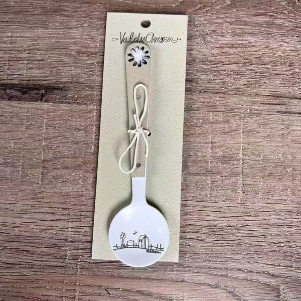 Enamel sugar spoon with wooden handle and farmhouse flower engraving