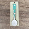 Enamel sugar spoon with wooden handle and laser engraved flower design