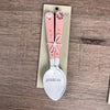 Set of enamel teaspoons with pink wooden handles and birds on a wire engraving