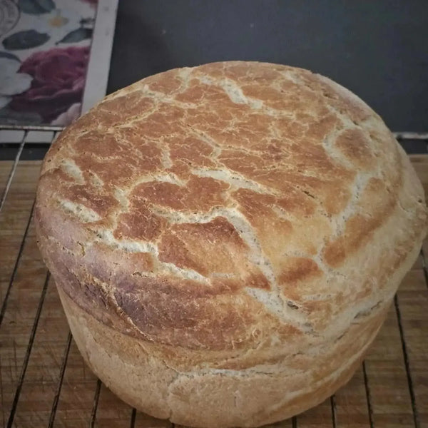 Eureka Mills Potbrood Easy Home Mix with freshly baked bread.