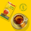 Freshpak Rooibos Tea 80's box with a cup of brewed rooibos tea on a yellow background, highlighting natural goodness and caffeine-free attributes