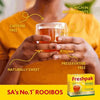Freshpak Rooibos Tea box with a person holding a steaming cup, highlighting caffeine free, antioxidant rich, preservative free, and naturally sweet features