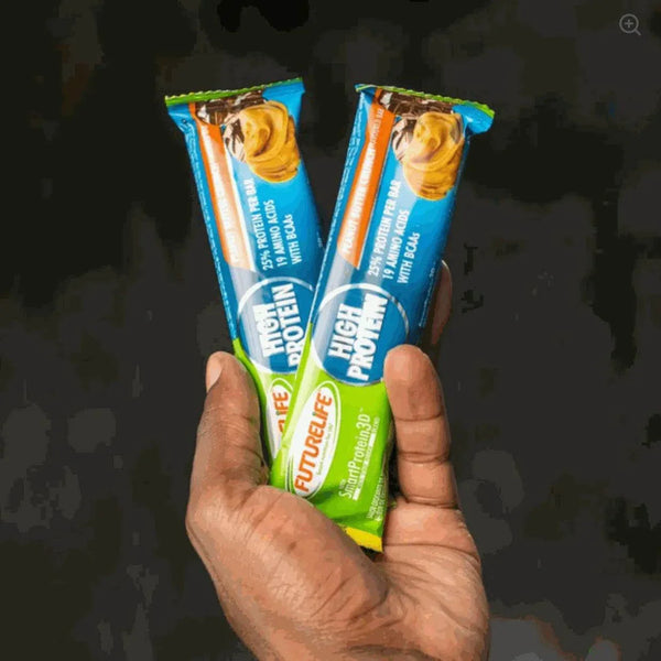 Futurelife Energy Bar – Peanut Butter Crunch, high-protein snack bars in hand.