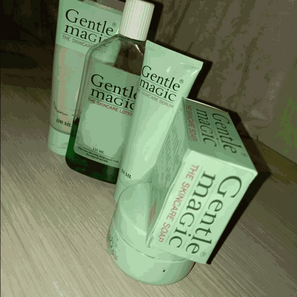 Gentle Magic skincare cream, lotion, serum, and soap collection on display.