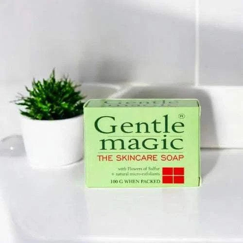 Gentle Magic Skincare Soap Bar 100g on bathroom counter near a plant.