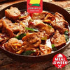 Gorima's Spice Romborossi chicken curry in a pan with vibrant spices and herbs