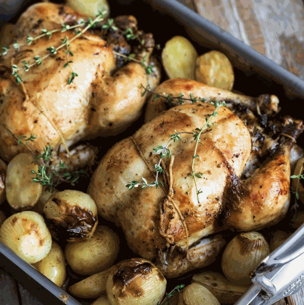 Ina Paarman Lemon & Herb Coat & Cook Sauce with roasted chicken and vegetables.