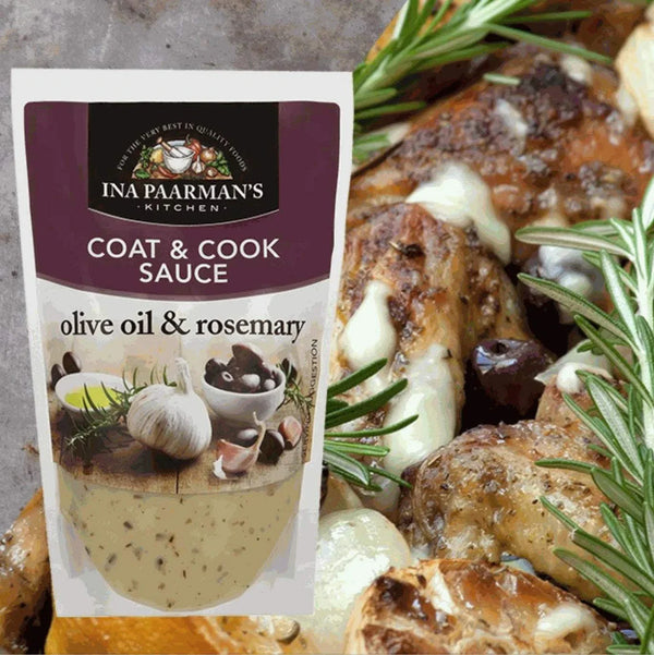 Ina Paarman Olive Oil & Rosemary Coat & Cook Sauce 200ml with garlic and herbs in background.