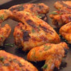 Grilled chicken coated with Ina Paarman Peri-Peri sauce.