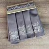 Set of 4 hand printed linen serviettes with inspirational phrases Faith, Dreams, Laugh