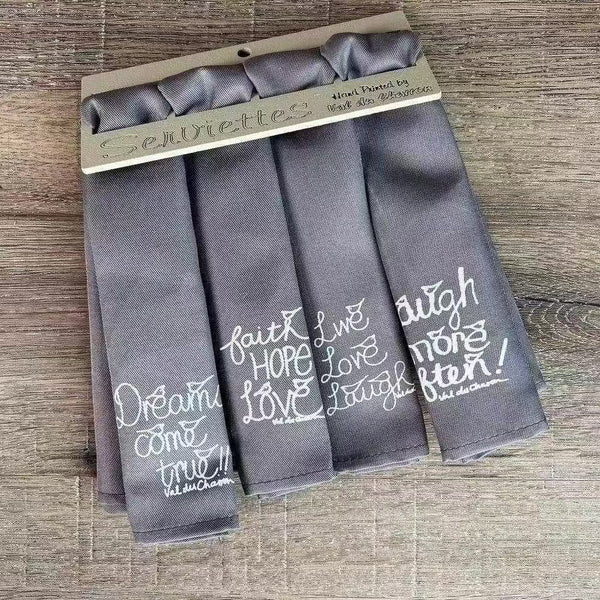 Set of 4 hand printed linen serviettes with inspirational phrases Faith, Dreams, Laugh