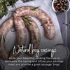 Raw natural hog casings sausages with rosemary and peppercorns on parchment paper for boerewors casings
