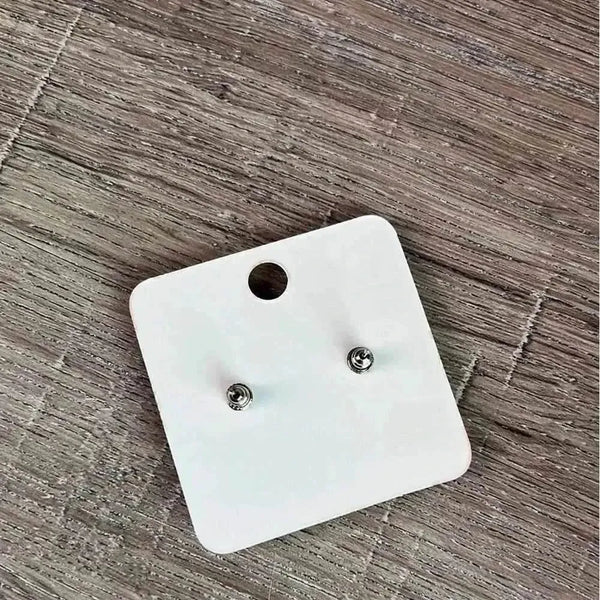 Red circular stud earrings with engraved owl design, 15mm diameter, sold in pairs