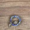 Set of 6 blue, green, and white beaded serviette rings made with love
