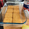 Silverleaf Guava Halves in syrup with biscuits in a glass container.