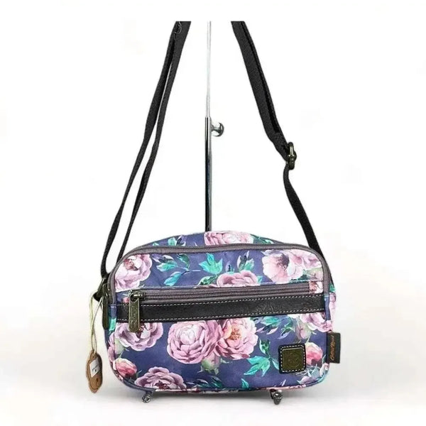 Cotton Road canvas sling bag with purple flowers, multiple zip compartments, adjustable strap