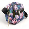 Canvas sling bag with purple flowers and multiple zip compartments