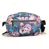 Canvas sling bag with purple flowers and adjustable strap