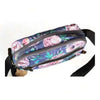 Canvas sling bag with purple flowers and multiple zip compartments