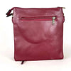 Maroon PU leather sling bag with adjustable strap and lattice detailing