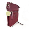 Maroon PU leather sling bag with adjustable strap and lattice detailing