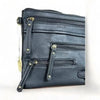 Black PU leather sling bag with adjustable strap and multiple zip compartments