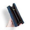 Cotton Road large wallet in navy blue PU leather with pink floral design and double zip compartments for cards and coins