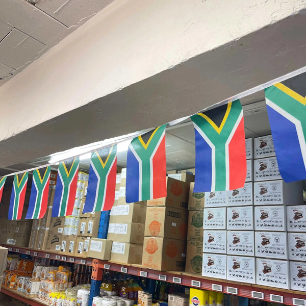 South African flag bunting displayed indoors.