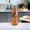 2-litre bottle of Stoney Ginger Beer with strong ginger flavor for refreshing family-sized beverage