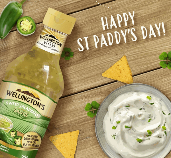 Wellington's Sweet Jalapeno Sauce 700ml bottle with chips and dip, perfect for adding flavor to meals.